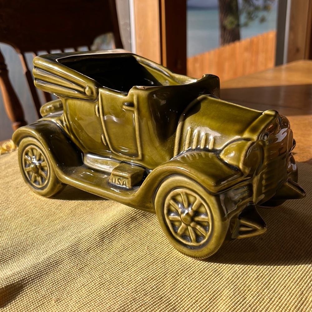 Pottery planter “antique roadster” in avacado green circa 1950’s